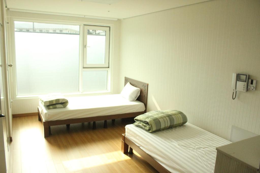 Hostel Phil House Guri Zimmer foto